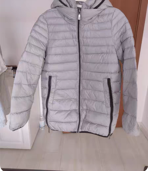 包邮拉夏贝尔品牌女士中长款灰色羽绒服。尺码...