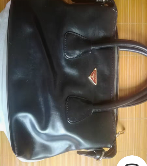 包邮Mexican稻草人女款手提包。买了没...