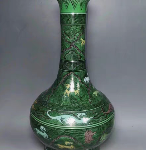 包邮素三彩海兽瓶 感兴趣的话点“我想要”和...