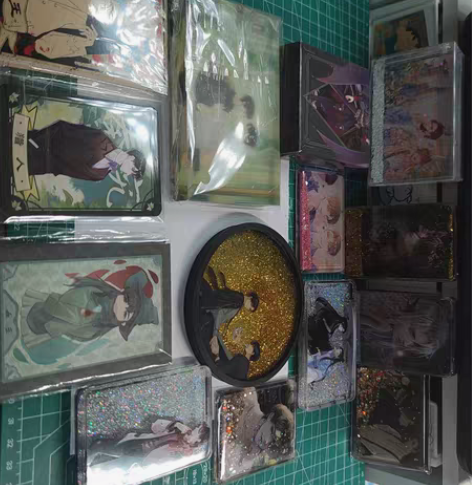 出各种书周边 各种流沙麻将，流沙杯垫，流沙...