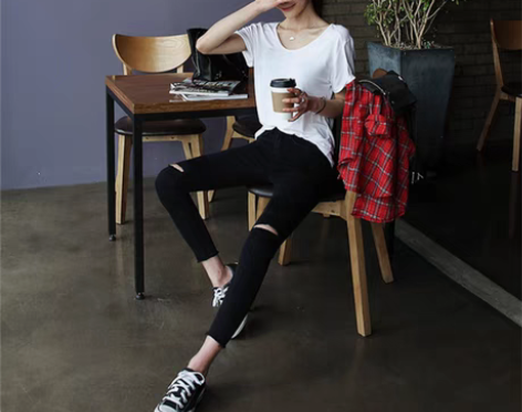 转卖破洞牛仔裤女黑色高腰九分小脚秋冬紧身2...