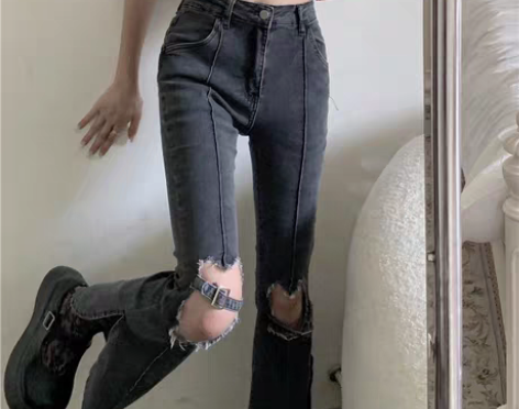 转卖辣妹破洞裤子女设计感小众夏季喇叭裤高腰...