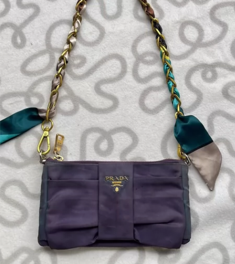 Prada普拉达蝴蝶结手机包手拿包链条包尼...