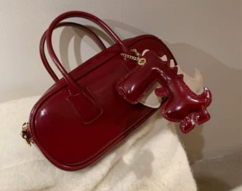 ?南风Chio2nd原创 红日朗手提皮包包...