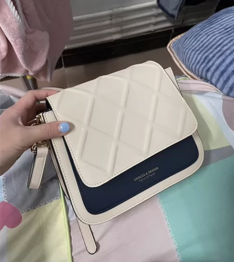 ??蔻一（Cnoles）牛皮包包女包202...