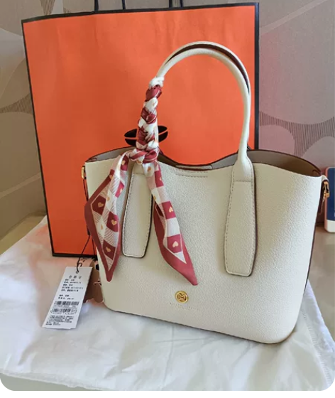 稻草人女士提包！朋友在欧亚给买的，原价59...