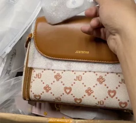 欧时纳正品单肩斜挎包，全新未使用，喜欢的直...