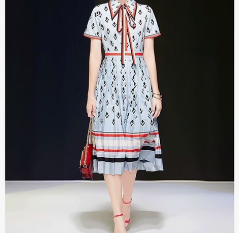 专柜正品夏装港风女装翻领短袖单排扣印几何拼...