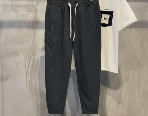 LUUD 黑色百搭休闲束脚裤子卫裤男士复古...