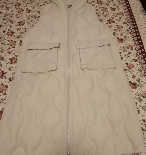 闲置秋冬羽绒长背心 感兴趣的话点“我想要”...