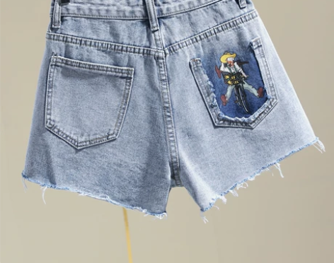 高腰破洞牛仔短裤女夏浅蓝色个性后口袋撕破卡...