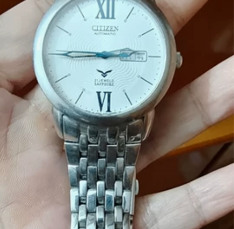 西铁城手表，已经不走钟了，要自己修理，包邮...