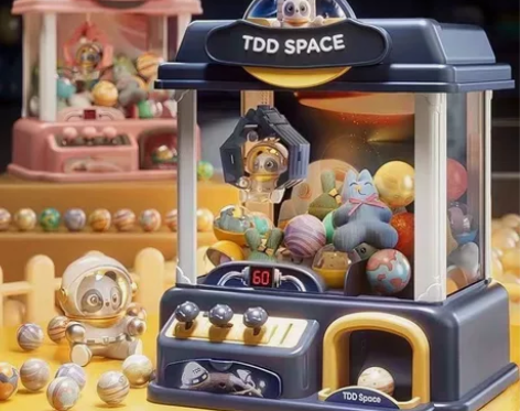 厂家直销淘嘟嘟迷你抓娃娃机投币夹公仔机儿童...