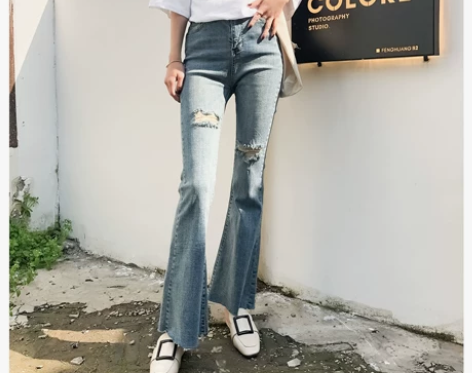 原宿风烂破洞牛仔裤女九分高腰显瘦喇叭裤20...