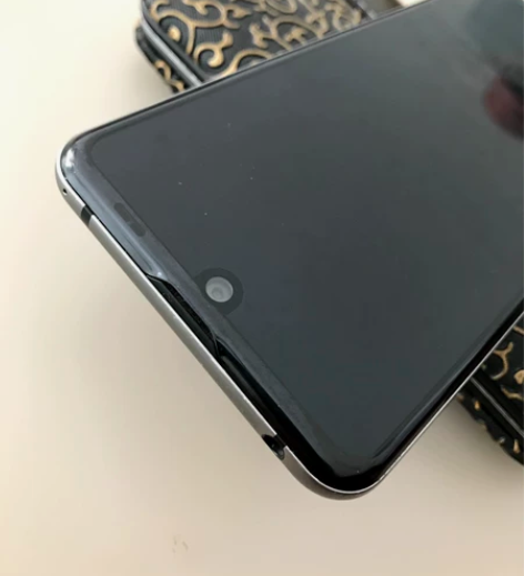 夏普r3 128g的  成色如图  屏幕底...