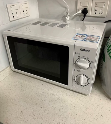 搬家低价出二手格兰仕美的微波炉家用小型机械...