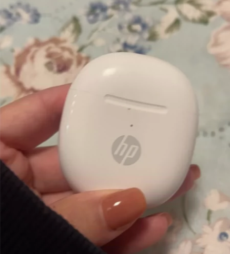 惠普蓝牙耳机 左右耳裂开了点可以用 还有耳...
