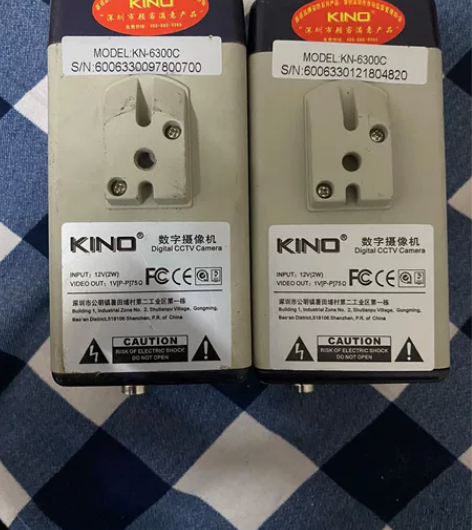 数字摄影机，牌子不认识，一个全新，一个外观...