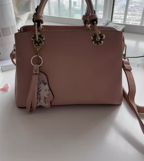 袋鼠真皮包，拎过两次，98新，专柜购买 感...