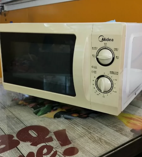 出售闲置美的微波炉，九成新，功能正常，需要...